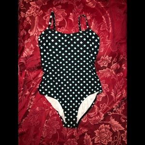 Never been used, brand new one piece bathing suit